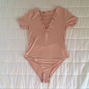 Forever 21 Pink nude short sleeve body suit